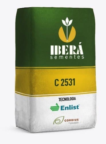 Foto da embalagem de sementes com tecnologia Enlist na soja. A embalagem é retangular, nas cores verde escuro, amarelo mostarda e branco. A marca é Iberá sementes.