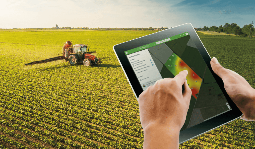 Produtor controlando informações de um trator pelo tablet